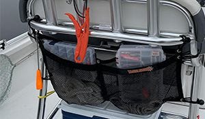 tackle web storage bag secured to leaning post to hold fishing gear