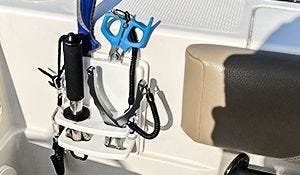 tool holder on boat demonstrating that holds boga grip, knife, scissors and pliers