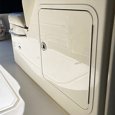 Aluminum framed tackle box installed in the console of a Boston Whaler 330 Outrage