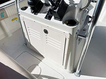 Bifold Starboard access door installed to the back of a boat console