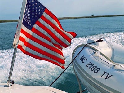 boat title on the bow of a dinghy boat