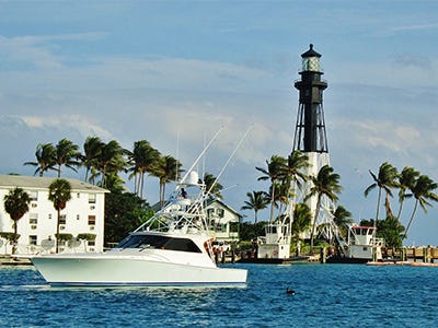 Viking boat pulling out of a Florida harbor