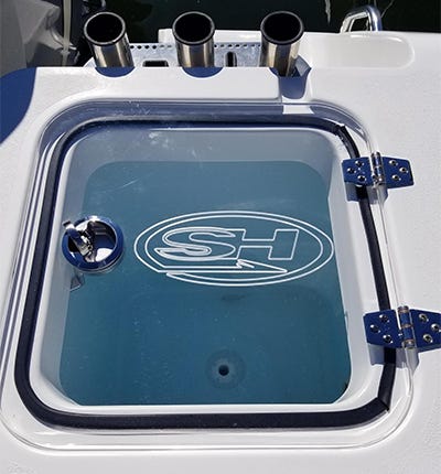 friction hinges installed on a Sea Hunt livewell lid