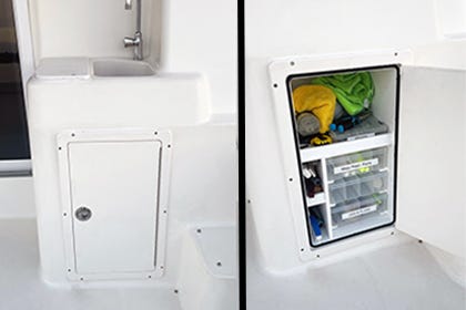 tackle box storage solution built into a boat for convenient storing of fishing gear while on the water