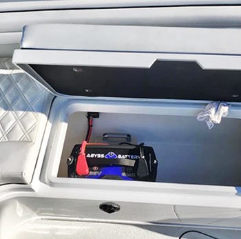 Abyss Lithium Battery installed into a center console.