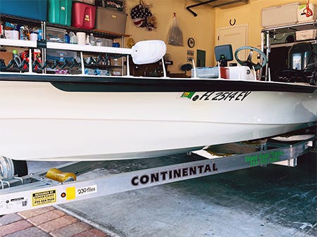 hull-slap solution with installed starboard spray rails to the underside of the Super Skiff boat hull