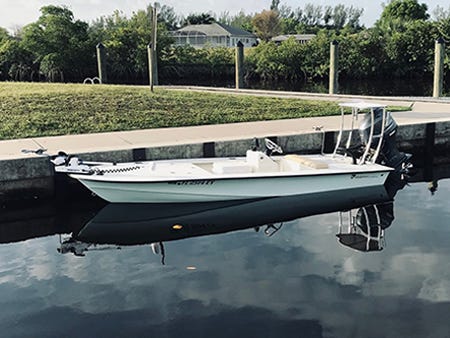 photo of Super Skiff boat docked to show the new build to install spray rails