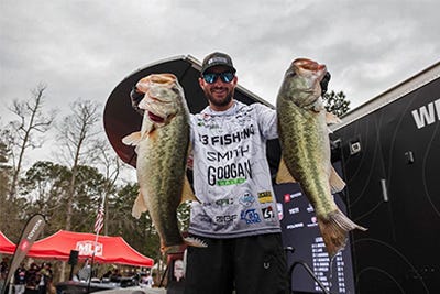 pro bass fisherman at fish weigh in