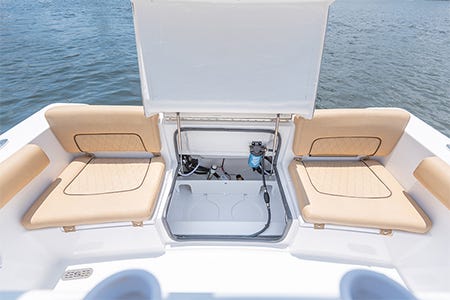 cleaning and inspecting the bilge on a Sportsman boat