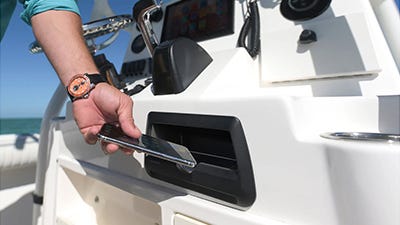 wireless phone charger installed on the console of a boat for better efficiency