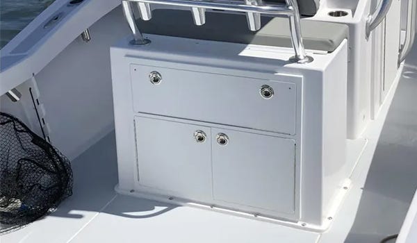 large boat tackle box inset into a fiberglass leaning post 