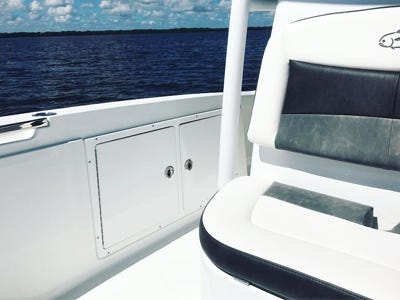 access doors installed on the side gunnel of a center console boat